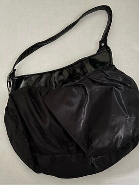 Vintage Avon Hobo style bag (pocketbook purse)  with patent leather like trim.